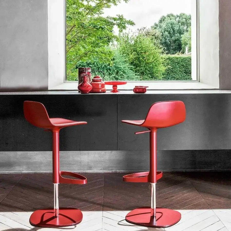 Exceptional Bonaldo Bonnie stool with red polypropylene shell and polished silver metal base offering ergonomic comfort