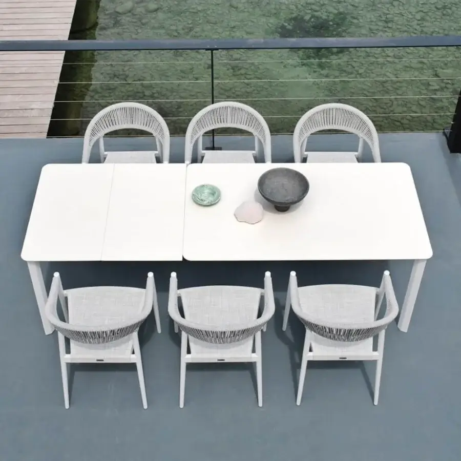 Sophisticated Varaschin System table crafted with powder-coated aluminum and a durable HPL tabletop in a light white tone
