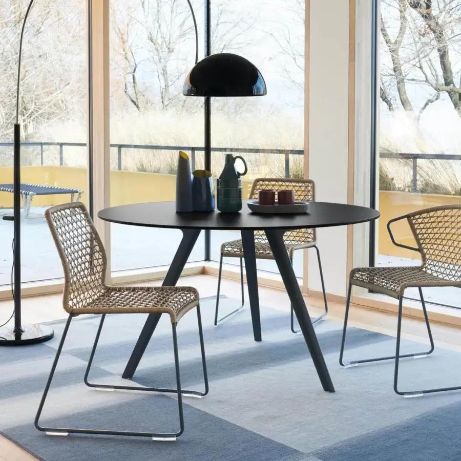 Exceptional Potocco Katana indoor table with matte black embossed painted metal base and smooth circular tabletop
