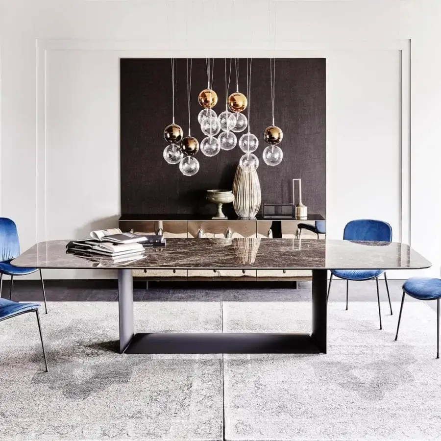 Elegant Cattelan Italia Dragon table with dark grey ceramic tabletop and matte black embossed lacquered steel base