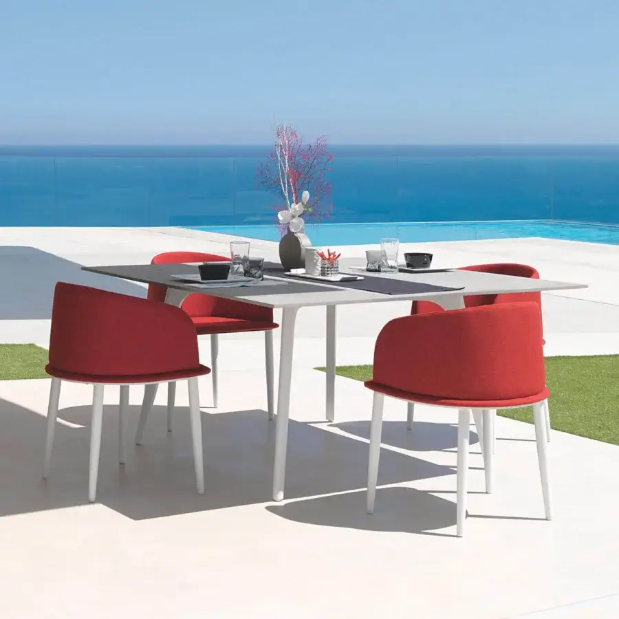 Distinguished Talenti Cleo Alu table crafted in white powder-coated aluminum with a light grey fibre cement top