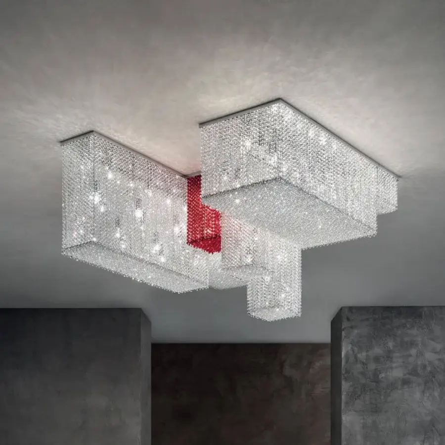 Innovative Masiero Cubo ceiling lamp with transparent crystal pendants and saturated red connecting elements in a shiny chrome finish