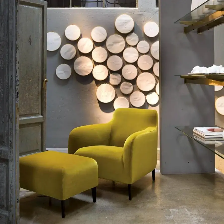 Exceptional Verzelloni Divanitas lounge chair with vibrant yellow textured textile upholstery and burnished cast aluminum legs