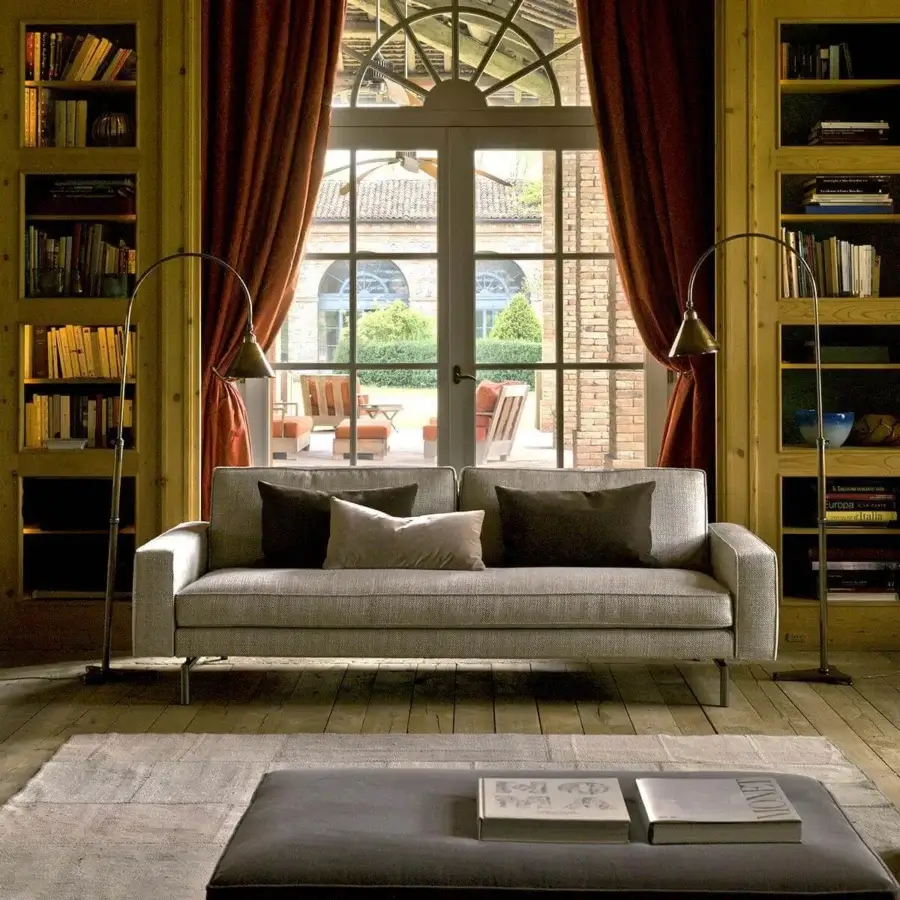 Distinguished Verzelloni Irving sofa with muted gray textured upholstery and bronzed painted aluminium bridge feet