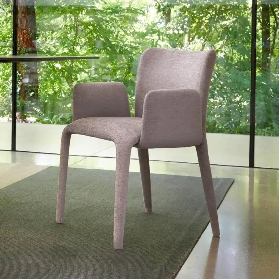 Distinguished Potocco Lars chair with fluid organically curved form and fully upholstered design in a muted dusty rose textile finish