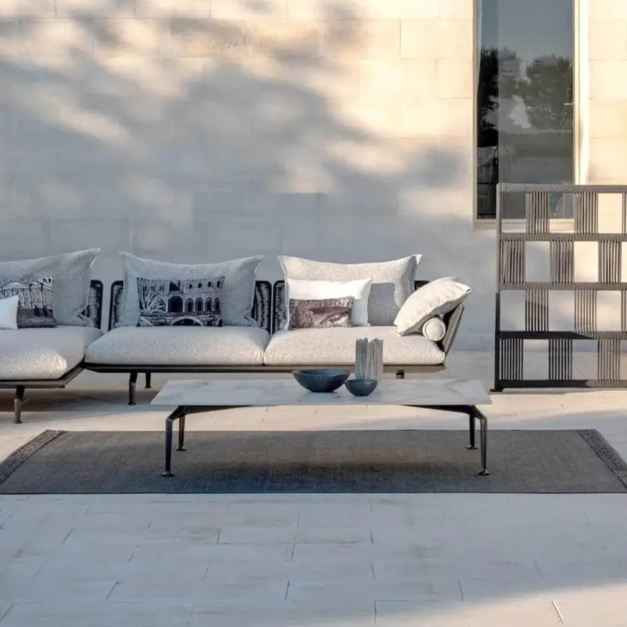 Distinguished Talenti Cruise coffee table with a Calacatta porcelain stoneware top and durable powder-coated aluminum frame in a dark gray finish