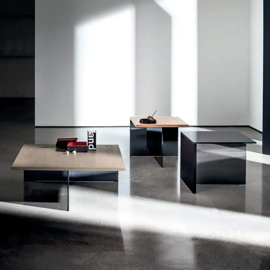 Sophisticated Sovet Italia Regolo coffee table with a satin light brown wood top and sharply angled dark metal base