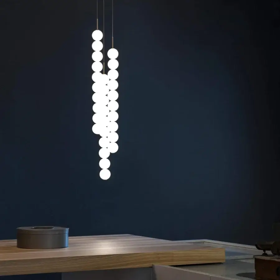 Exceptional Terzani Abacus multi light suspension lamp with brass and satin white glass spherical diffusers in a refined arrangement