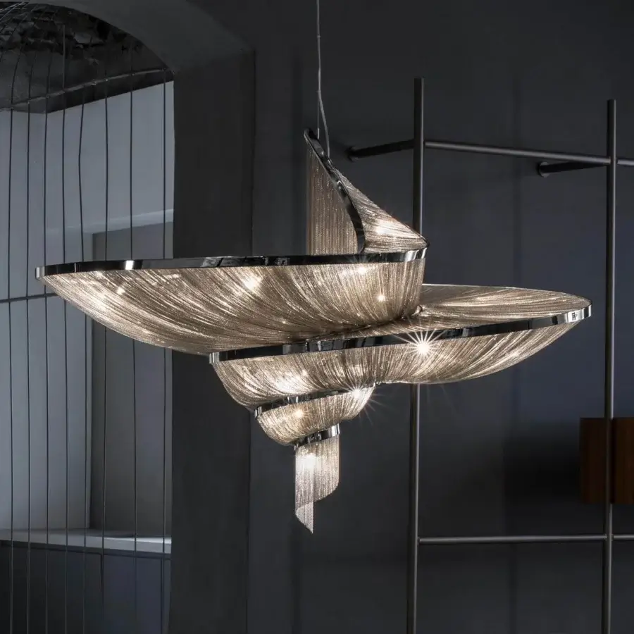 Exclusive Terzani Epoque suspension lamp crafted in silver-toned metal with brass chains and delicate mesh interior for a shimmering effect