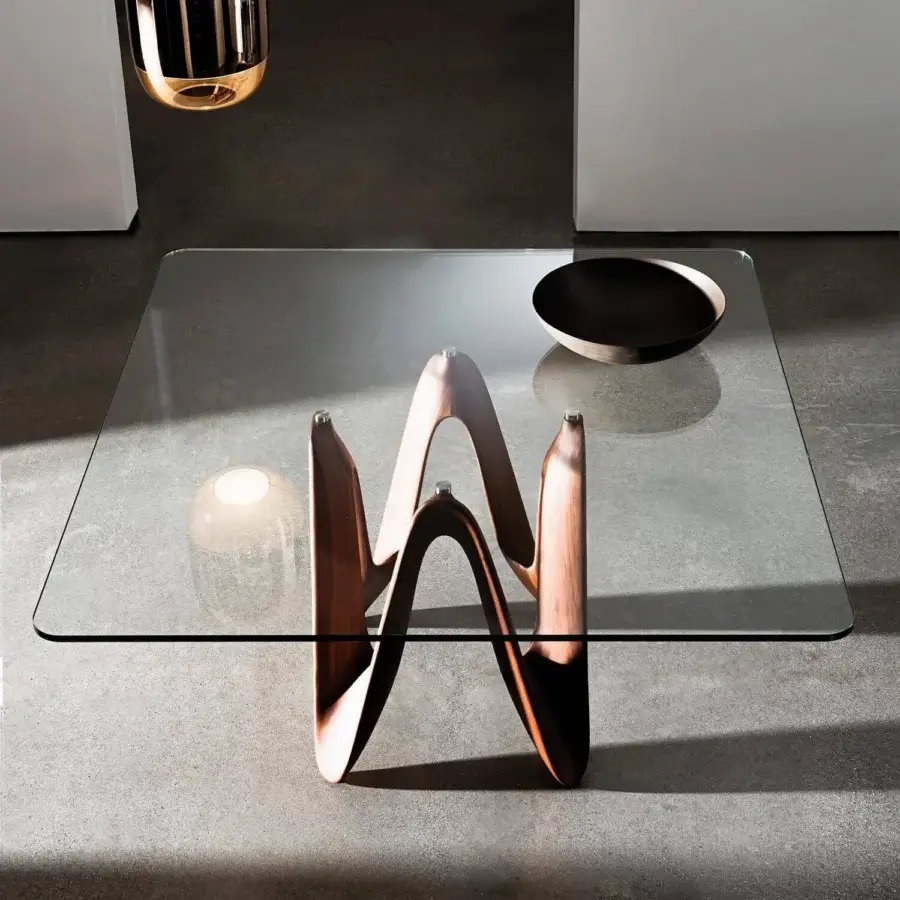 Exceptional Sovet Italia Lambda table with sculpted base in Canaletto walnut wood and clear tempered glass with satin finish