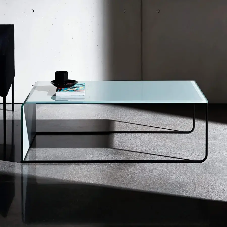 Sophisticated Sovet Italia Nido coffee table with rectangular clear glass tabletop and polished chrome metal frame