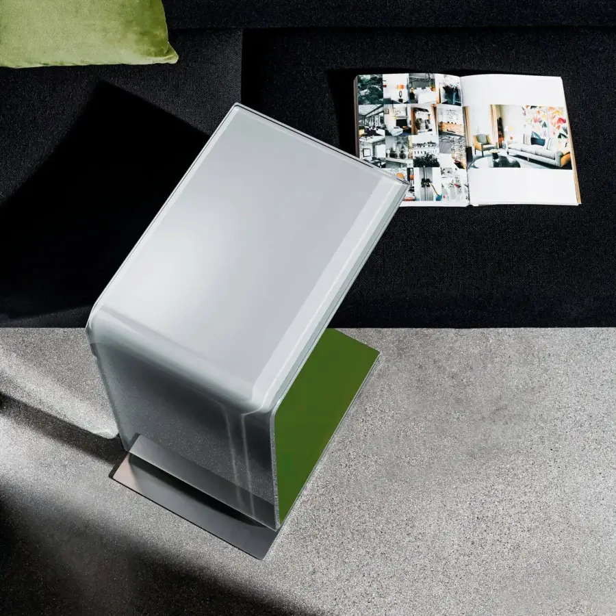 Distinctive Sovet Italia Swan side table with translucent white bent glass, green accent and polished metal base crafted in Italy