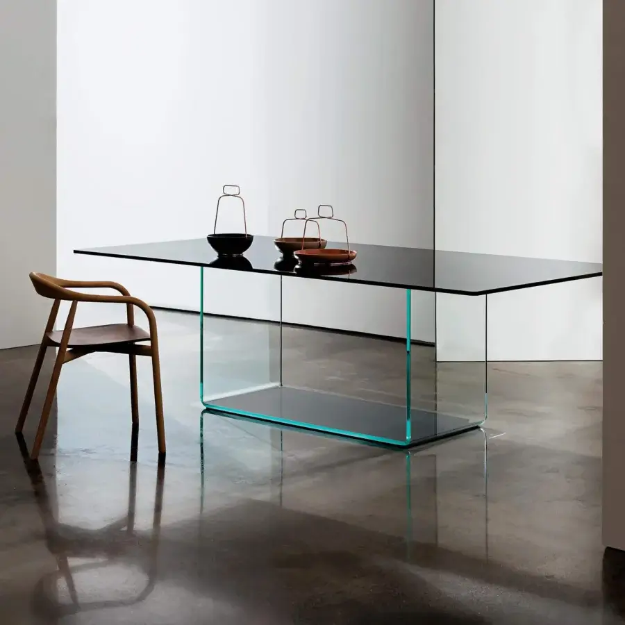 Sophisticated Sovet Italia Valencia table crafted with extra-light bent glass and tempered glass in a dark smoky gray-black finish