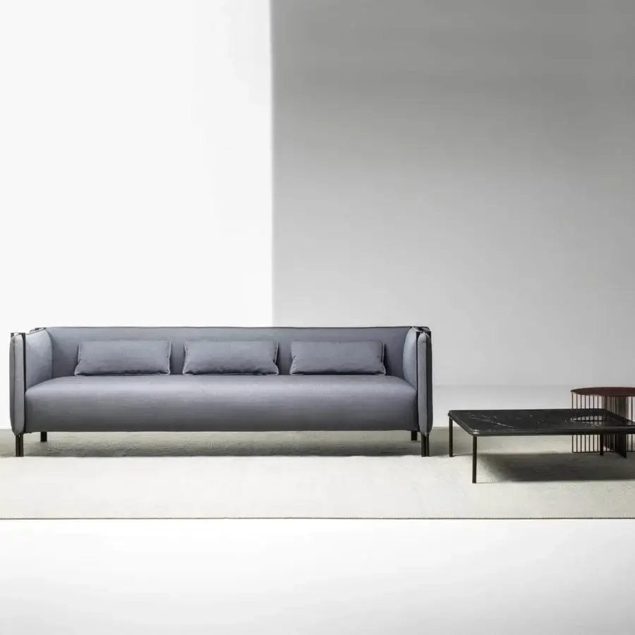 Superior LaCividina Pinch sofa with smooth matte medium gray textile and slender dark metal frame