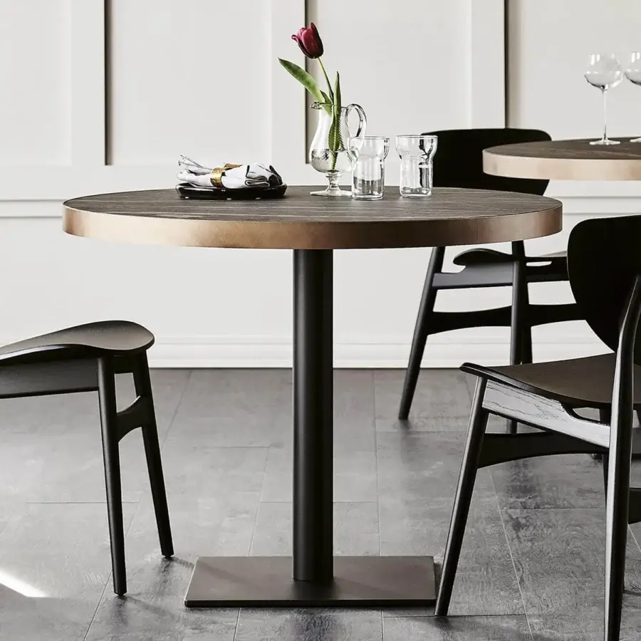 Distinguished Cattelan Italia Ribot Keramik table with Marmi Alabastro ceramic top and black embossed lacquered steel base in matte finish
