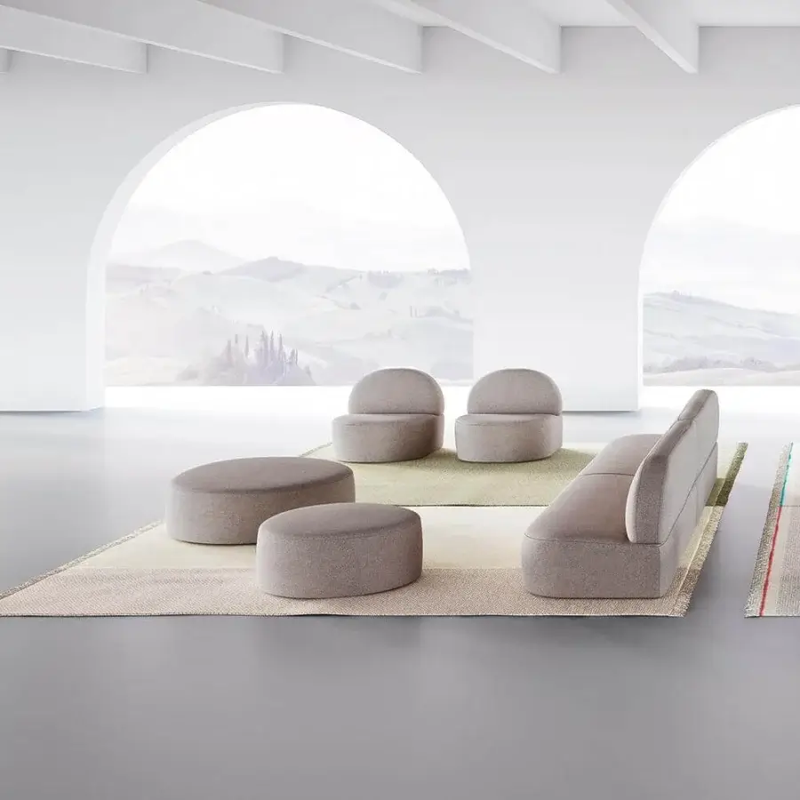 Distinguished LaCividina Guest Ottoman with rounded rectangular form and muted light taupe textured textile finish