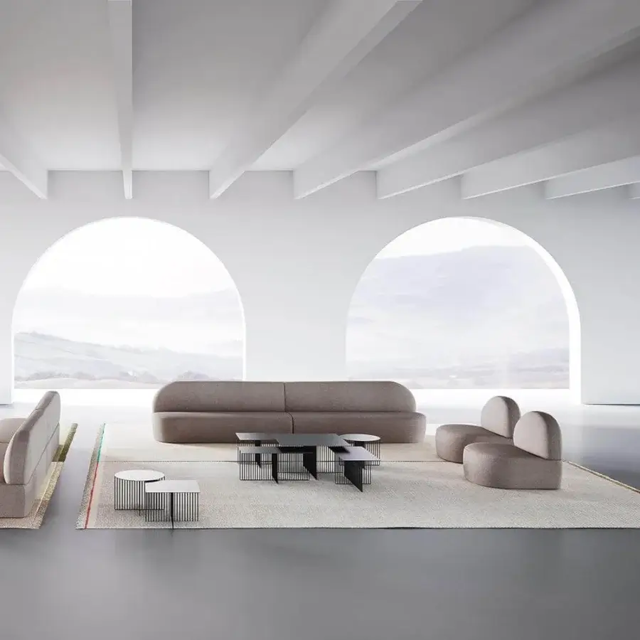 Sophisticated LaCividina Guest sofa with low curved silhouette and smooth warm beige-grey textile upholstery