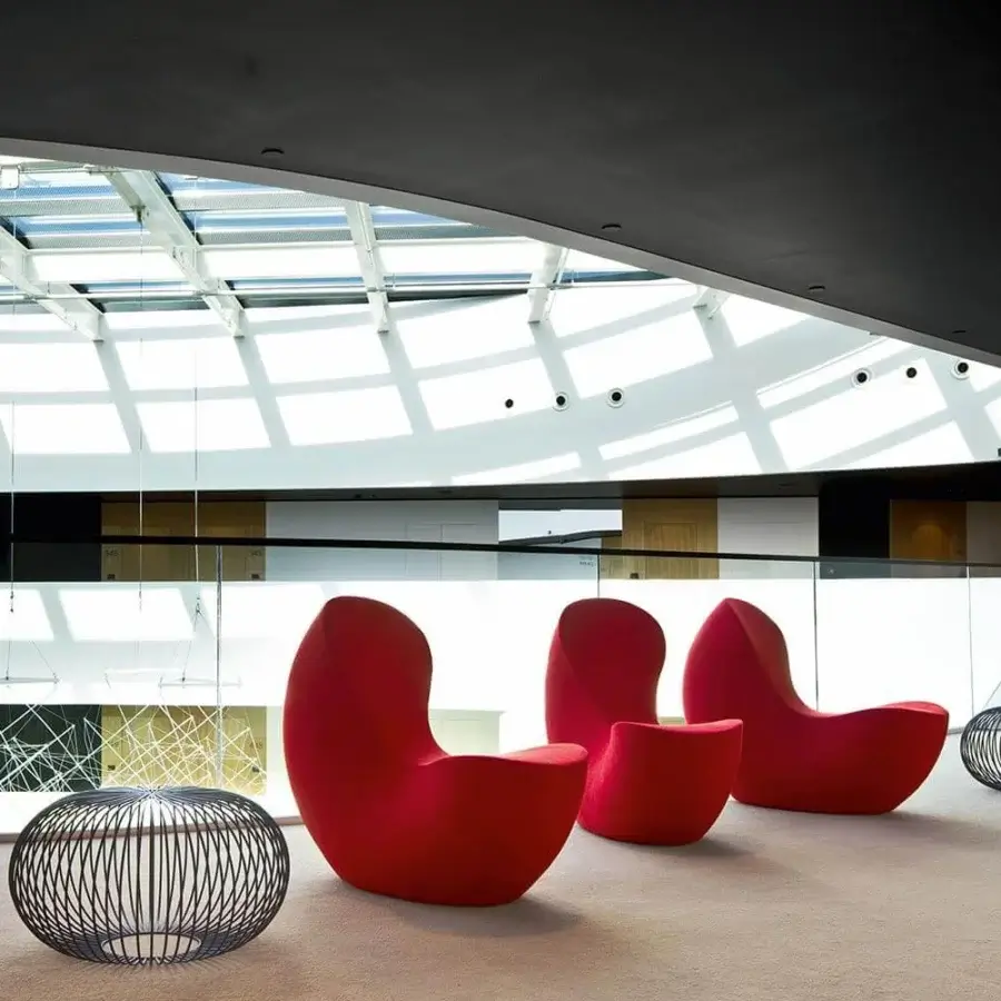 Exceptional LaCividina Nautile lounge chair with vibrant red fabric upholstery and sculpted wood frame