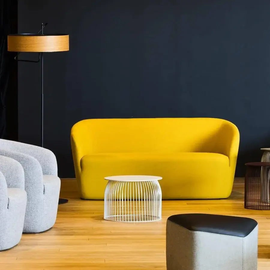 Distinguished LaCividina Dep sofa with soft lines upholstered in vibrant yellow textile fabric and smooth finish