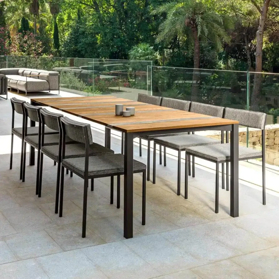 Distinguished Talenti Casilda table with rectangular wood top and dark gray powder-coated stainless steel stone slats