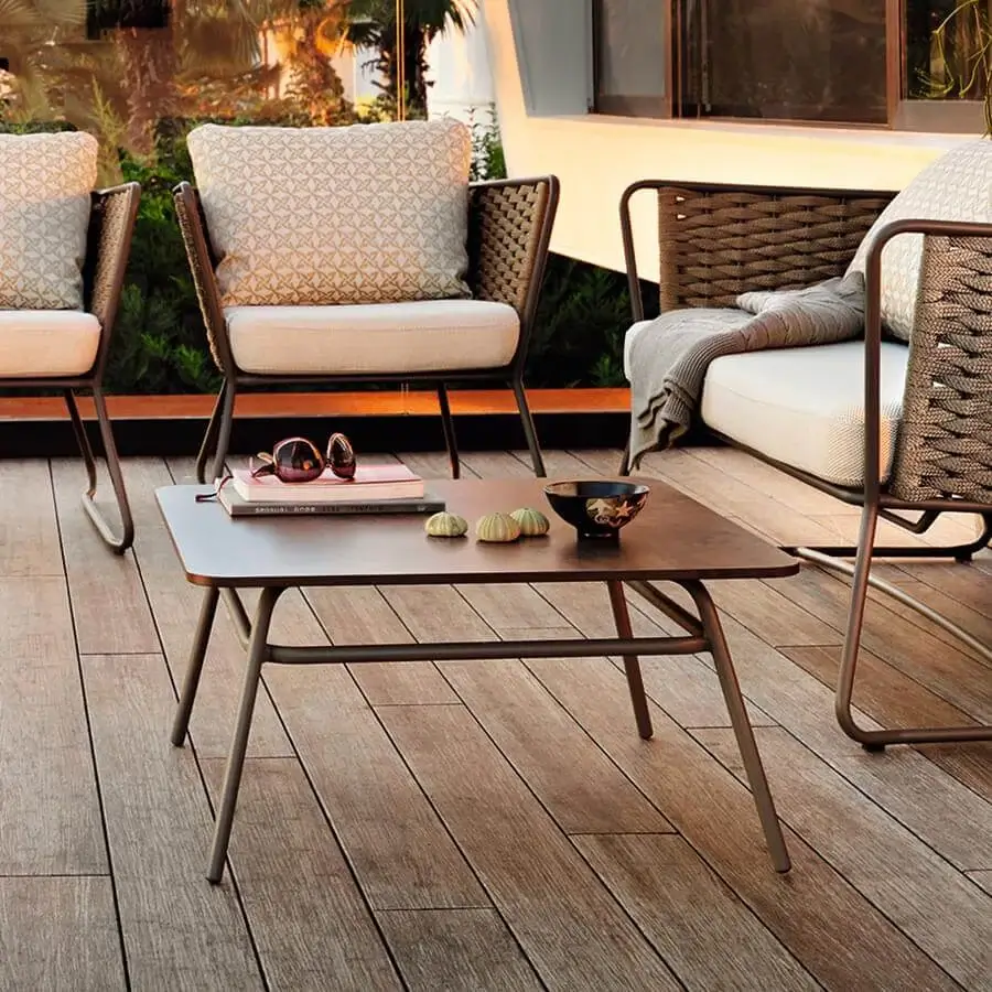 Elegant Roberti Rattan Portofino coffee table with aluminum base and CORTEN finish high-pressure laminate tabletop