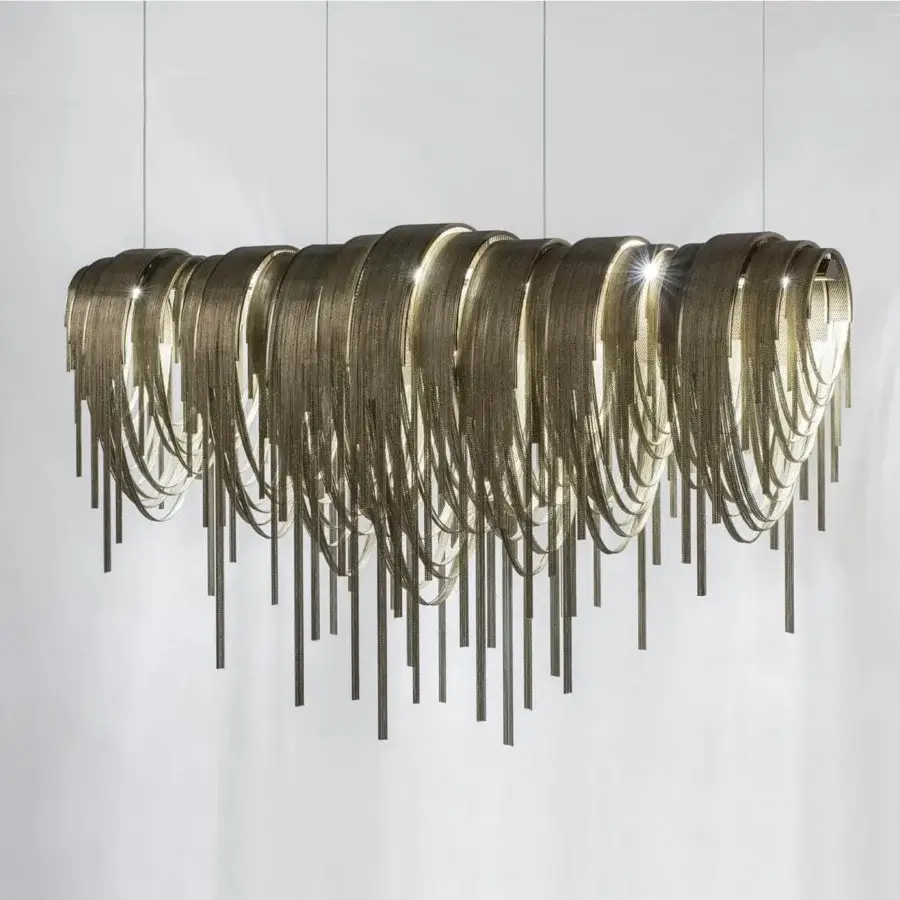 Stunning Terzani Volver suspension lamp crafted in brass with a satin finish and cascading metal rods