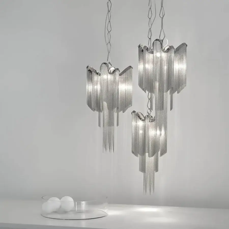 Distinguished Terzani Stream suspension lamp crafted in polished metal with cascading undulating tiers and silver finish