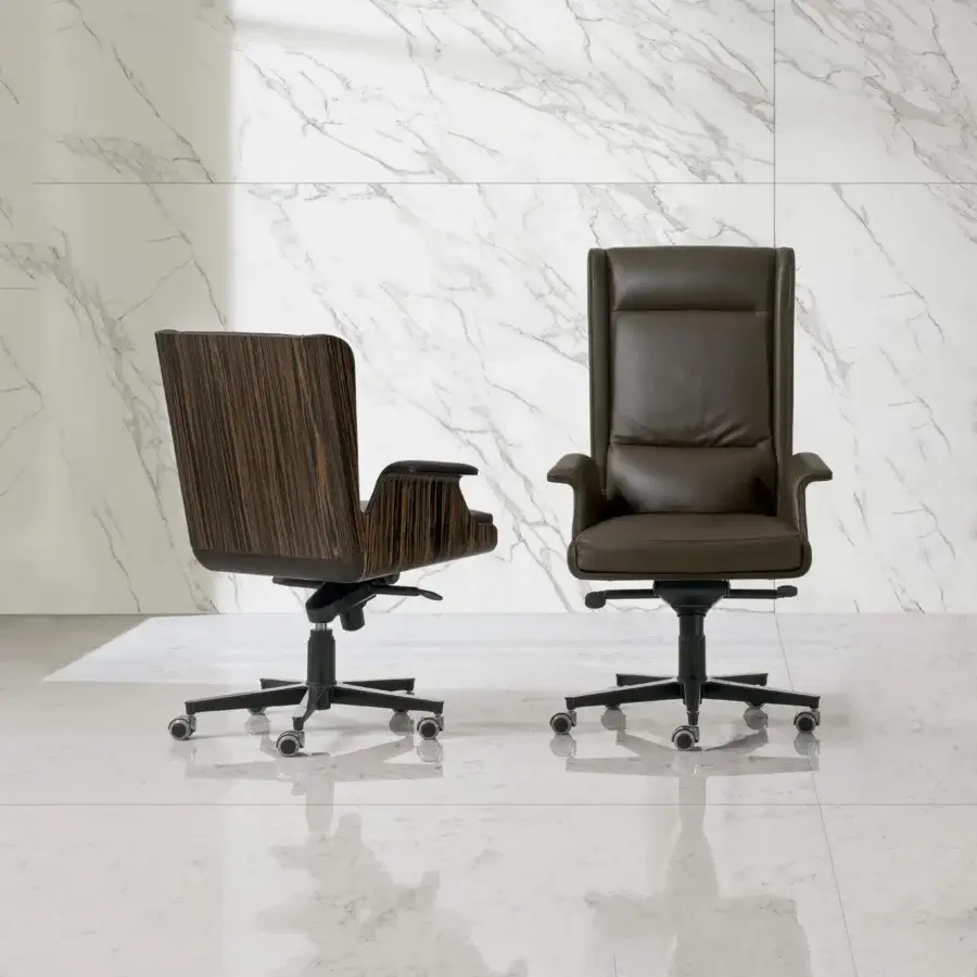 Sophisticated 4 Mariani Garbo armchair with swiveling black chrome base and muted olive-green synthetic upholstery exhibiting refined stitching details