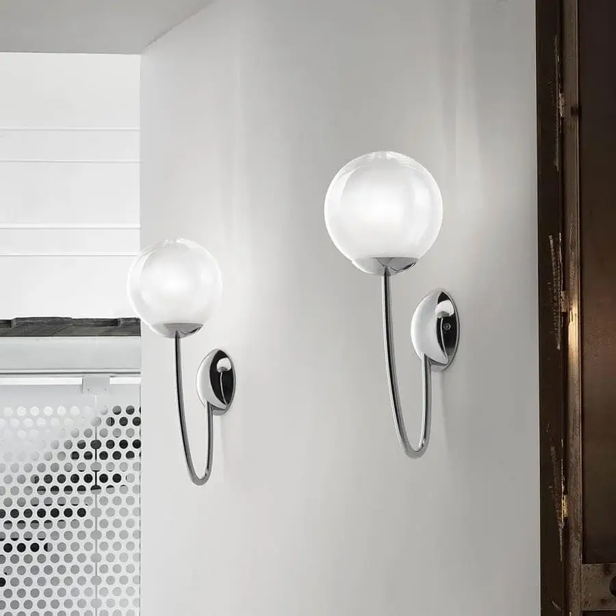 Refined Vistosi Puppet wall lamp crafted in Italy with white frosted glass and bright polished chrome components