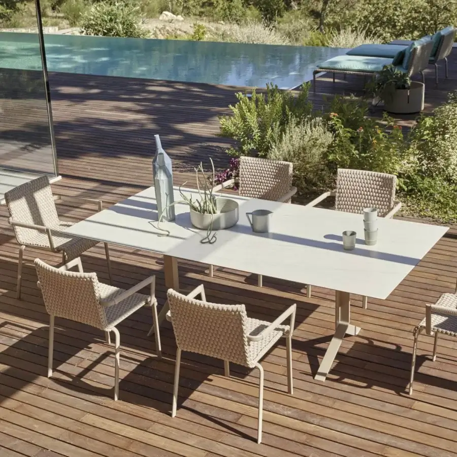 Sophisticated Roberti Rattan Key West table with powder-coated aluminum and a durable HPL tabletop in light beige finish