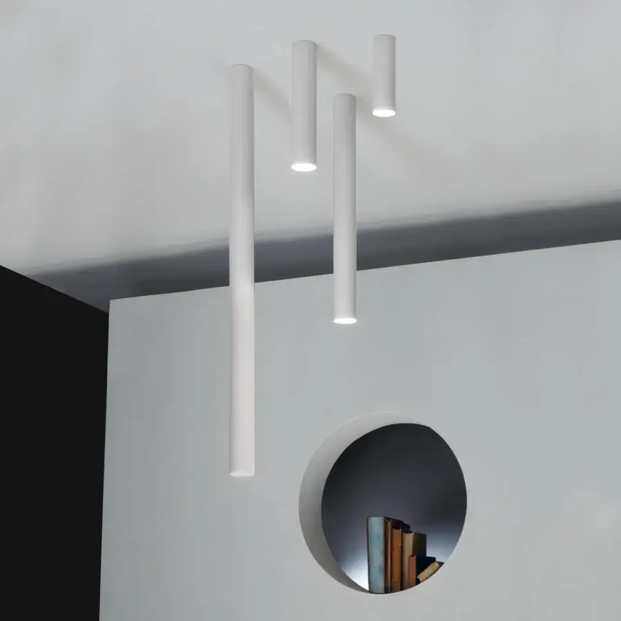 Superior Lodes A-Tube ceiling lamp crafted in matte white with a metal structure and vertically suspended cylindrical tubes
