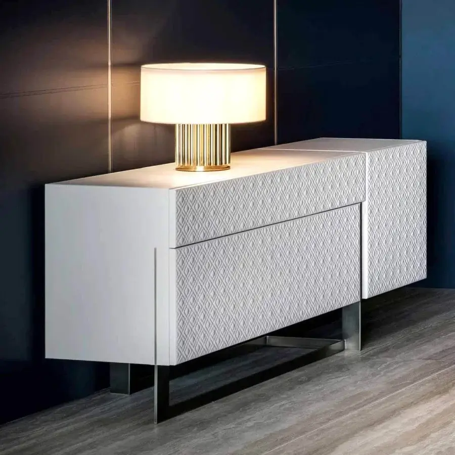 Superior Rugiano Blade sideboard with leather doors, matelassé embroidery, and brushed metal base details