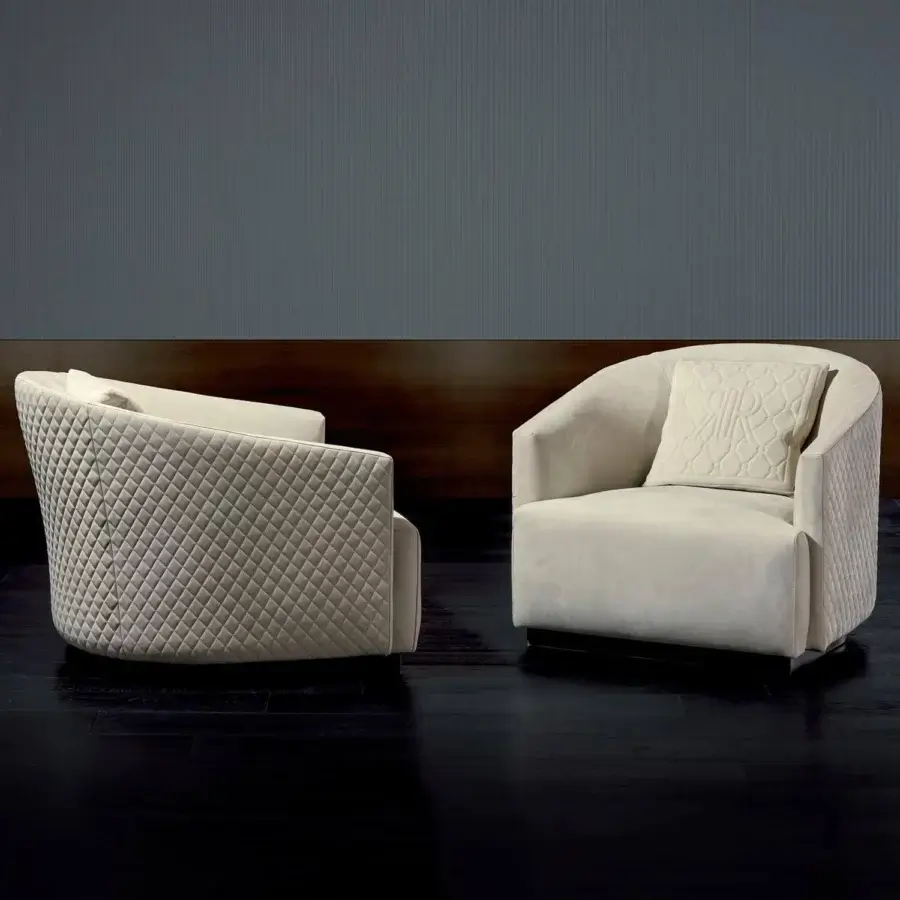 Distinguished Rugiano Opera lounge chair with light beige fabric upholstery and dark-toned wood base crafted with a quilted back detail