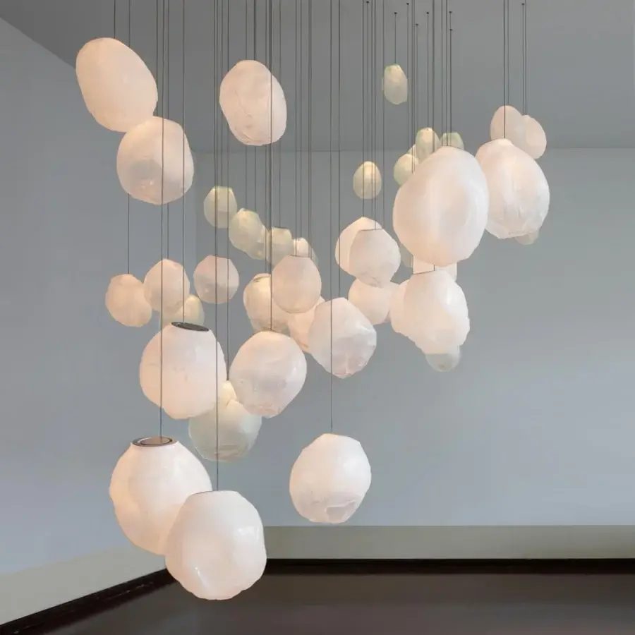 Captivating Bocci 73V suspension lamp crafted in ivory glass with a subtly wrinkled, diffused light finish