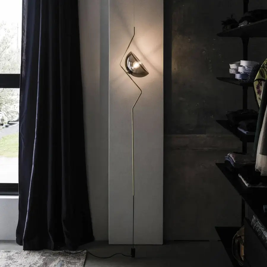 Elegant Cattelan Italia Tramonto floor lamp with brass steel frame and fumé glass lampshade exhibiting a muted gold finish