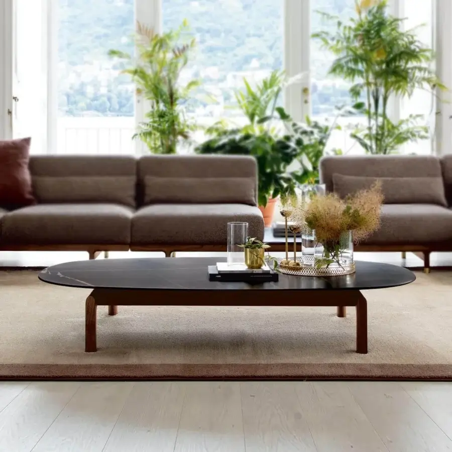Superior Porada Quay coffee table with dark gray marble top and recessed Canaletto walnut wood built with brushed brass legs