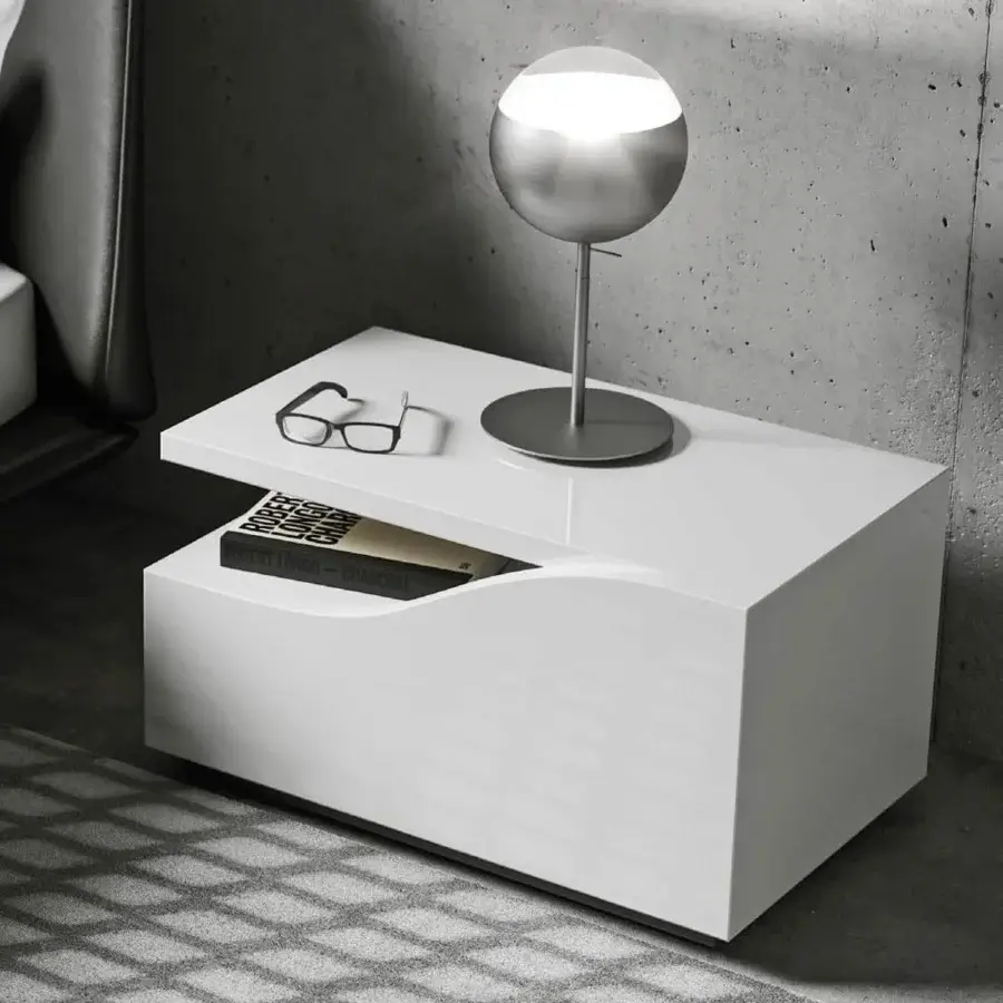 Elegant Reflex Segno nightstand with wooden structure, shiny lacquered finish and shaped drawer for streamlined storage