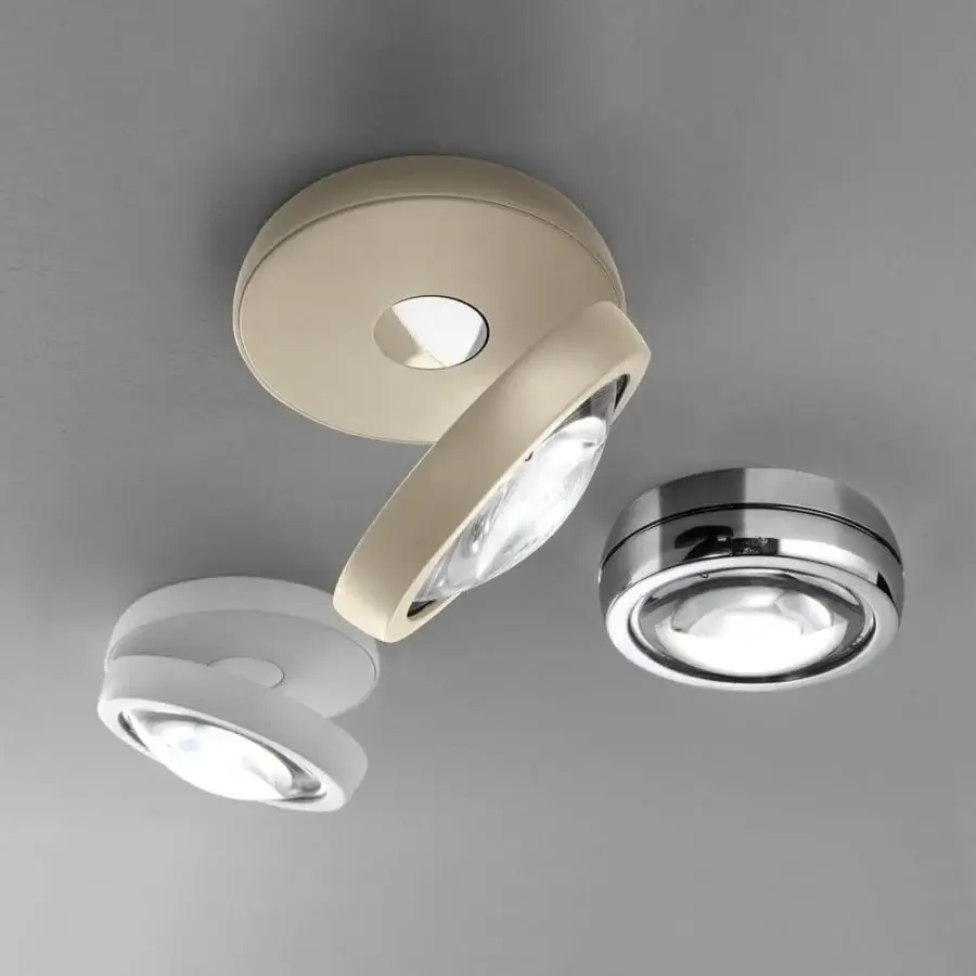 Exceptional Lodes Nautilus ceiling lamp with a pivoting shell-like head in light beige metal and satin finish