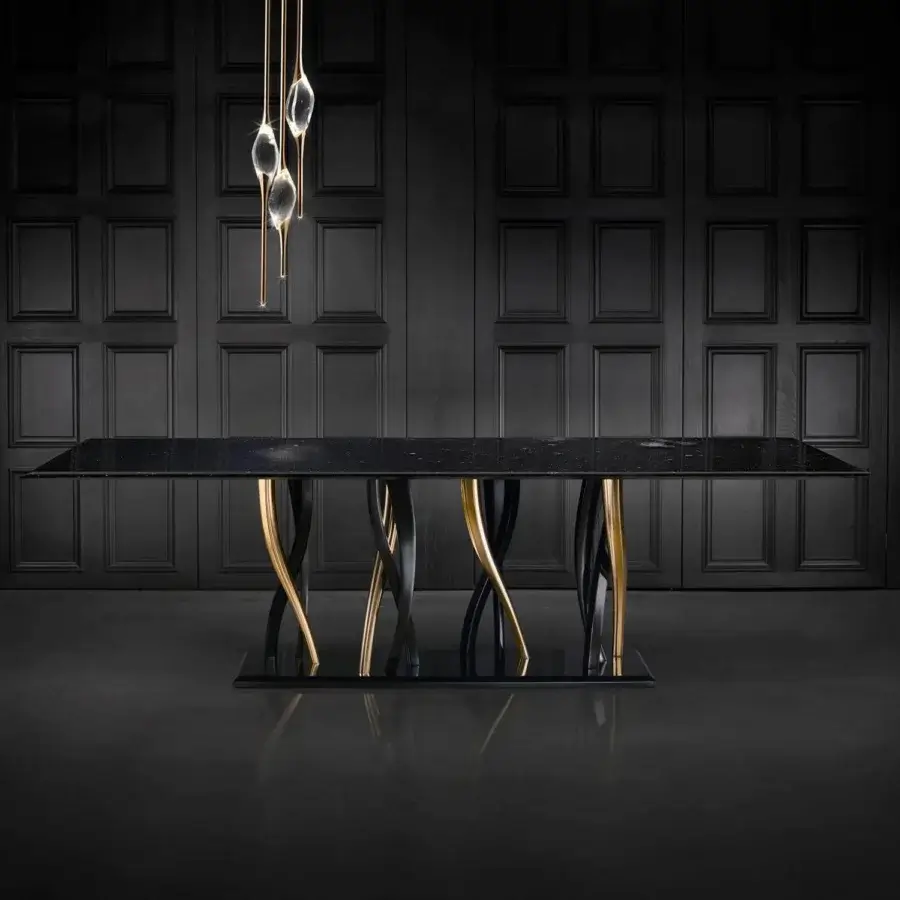Distinguished Il Pezzo Mancante Il Pezzo 8 table with black Marquinia marble tabletop and intricately intertwined black and gold finished legs