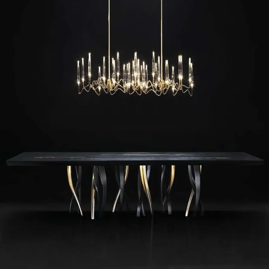 Exceptional Il Pezzo Mancante Il Pezzo 8 table with black stained oak, delicate gold inlays, and sculptural aluminum casting legs