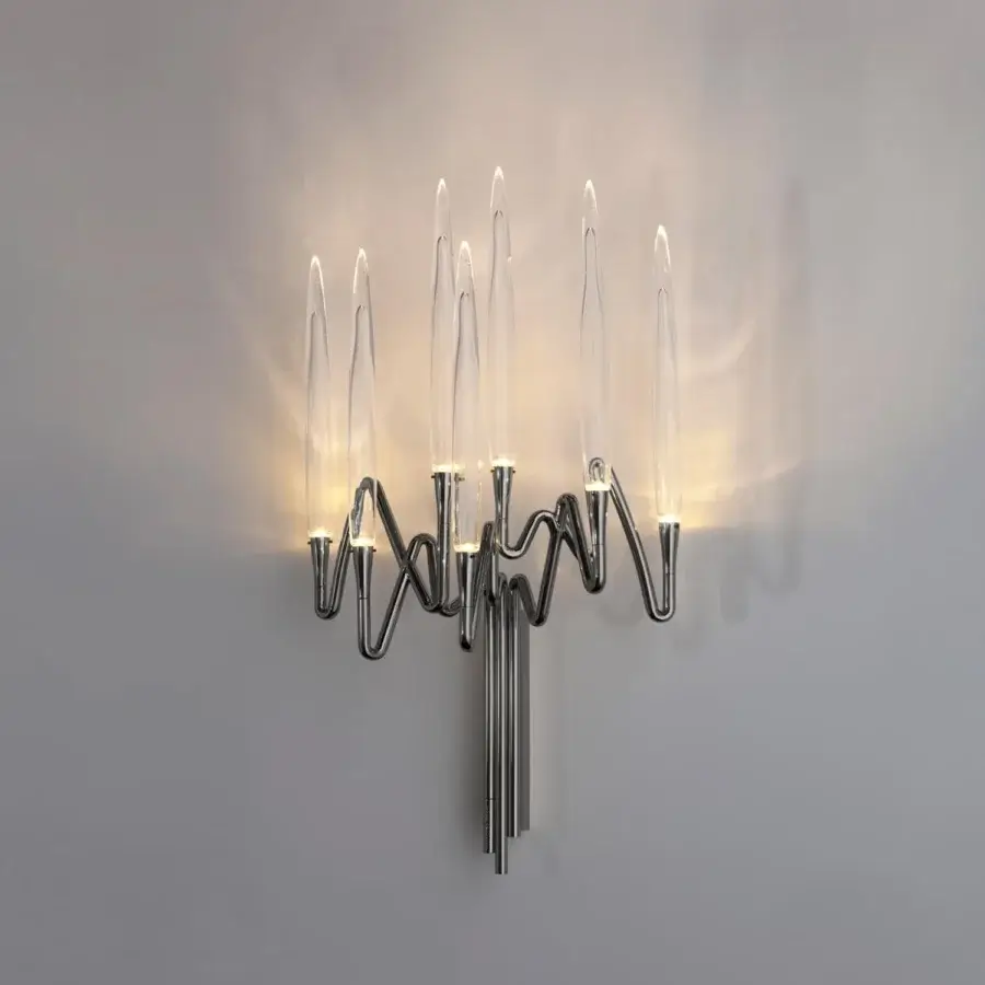 Distinguished Il Pezzo Mancante Il Pezzo 3 wall lamp crafted in hand-forged brass with clear solid crystal and polished silver finish