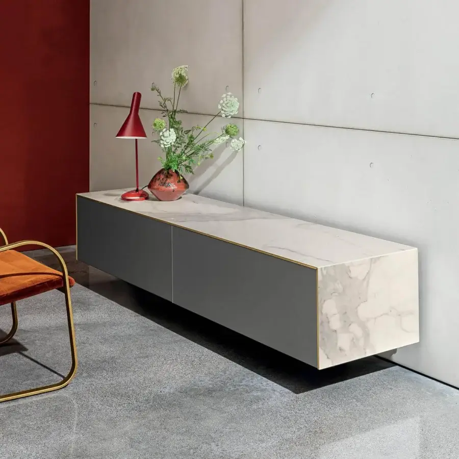 Superior Sovet Italia Magda sideboard with wood and marble-effect composite fronts, a matte grey finish and polished brass accents