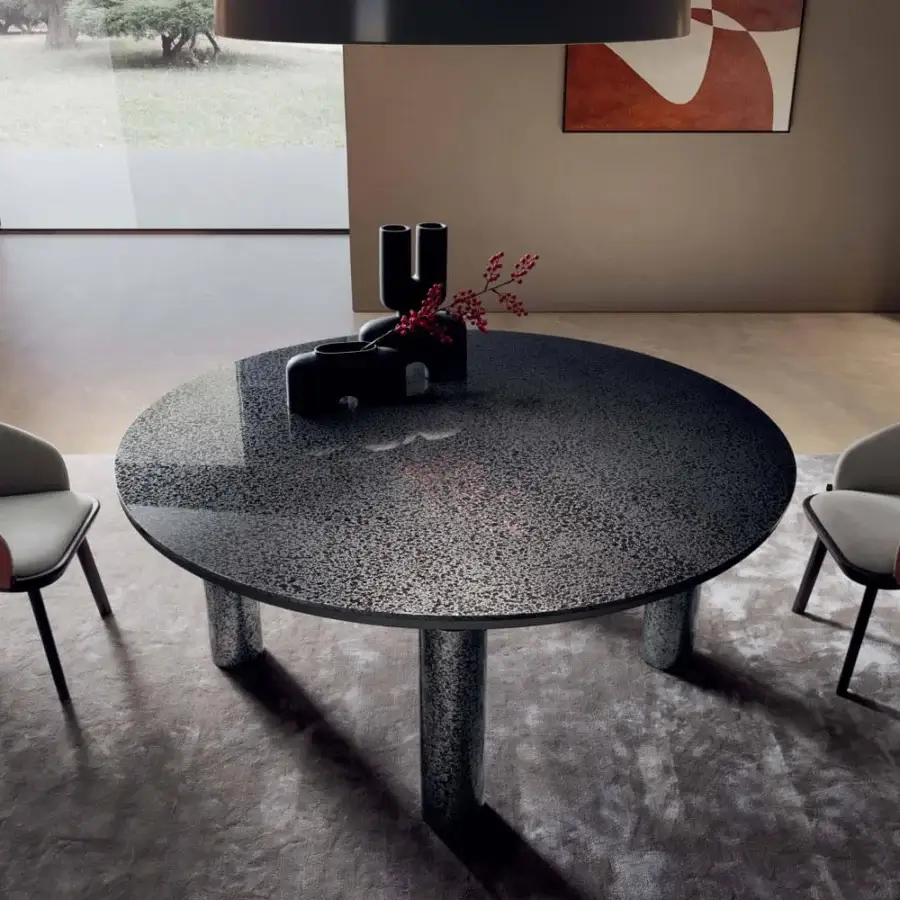 Elegant Presotto Kolosso table with speckled dark ceramic top and matte cylindrical legs crafted in Italy