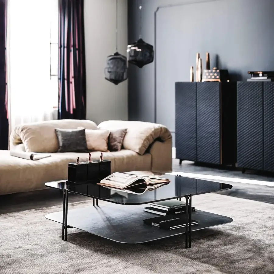 Distinguished Cattelan Italia Biplane coffee table with glass upper and precious Marmi ceramic lower, showcasing a sleek black metal frame