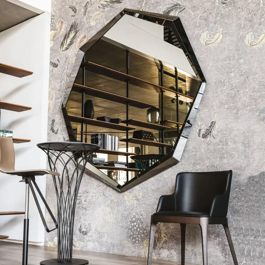 Elegant Cattelan Italia Emerald mirror with elongated hexagonal shape and fully mirrored multi-faceted frame creating a modern aesthetic