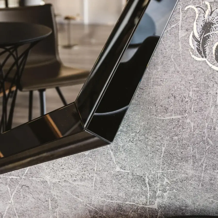 Distinguished Cattelan Italia Emerald mirror with a fully mirrored frame and glossy black finish creating a precious stone effect