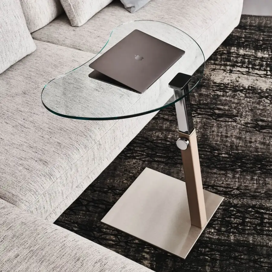 Elegant Cattelan Italia Lap side table with clear glass top and light brown leather-covered steel stem with matte steel base