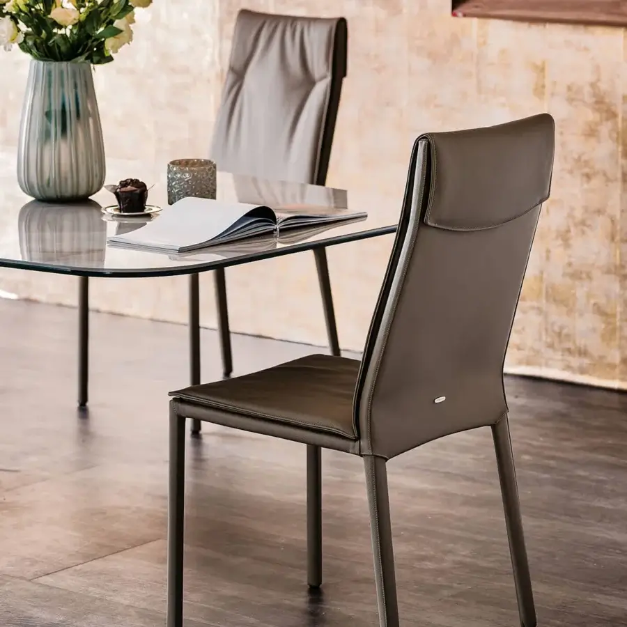 Distinguished Cattelan Italia Isabel chair with medium brown synthetic leather-like upholstery and sleek metal legs