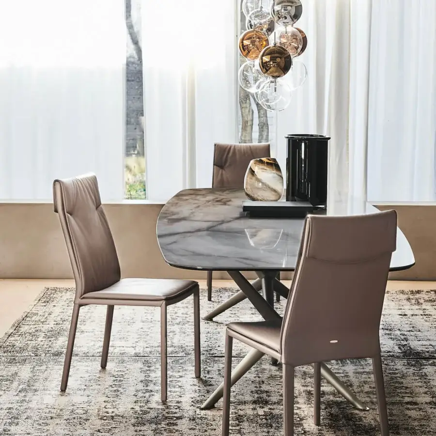 Elegant Cattelan Italia Isabel chair with taupe leather-like upholstery and slim matte-finished metal legs