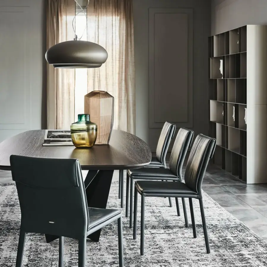 Superior Cattelan Italia Isabel chair with matte black upholstery and dark wood panel built with slender steel legs